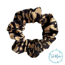 Load image into Gallery viewer, Black and gold animal print Scrunchie
